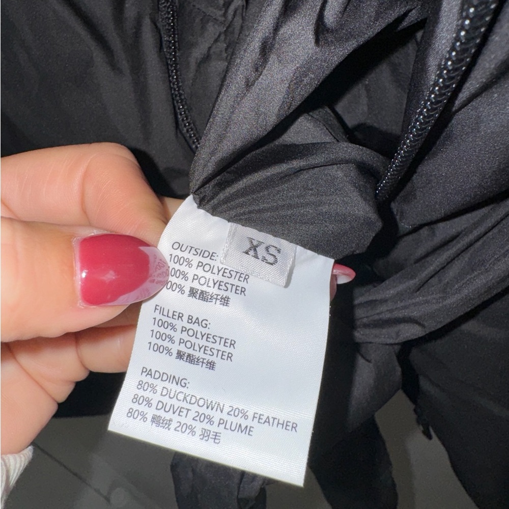 The Frankie Shop Aspen belted down vest in black - Picture 8 of 8